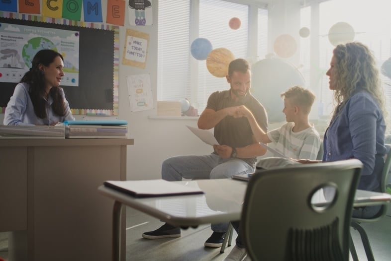 parent teacher conference in classroom