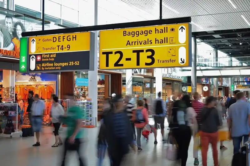 people walking through airport