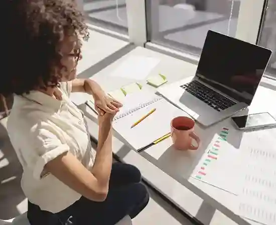 translator working on laptop